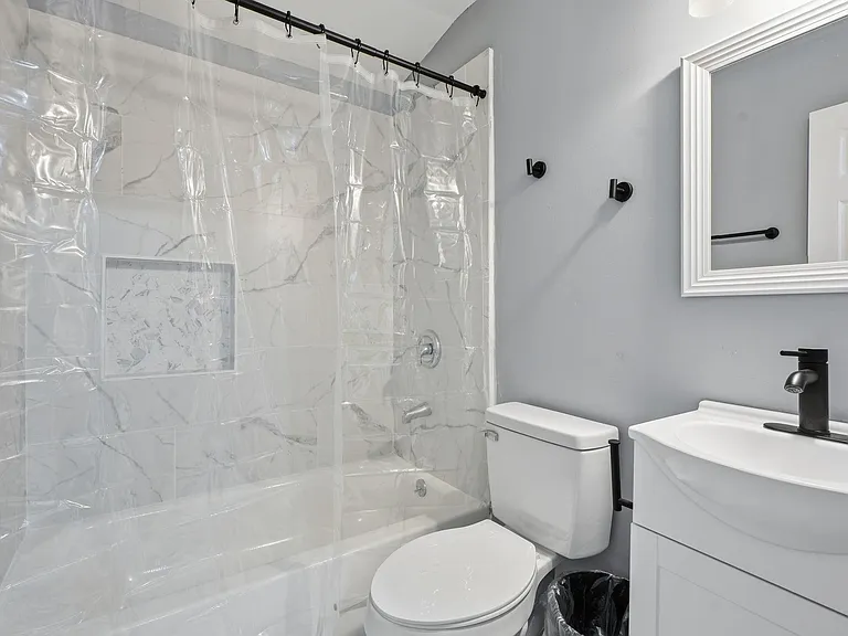Newly updated bathroom with shower/tub combination