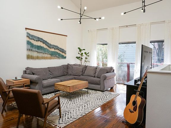 2nd floor large living room with vaulted ceilings and plenty of space for entertaining