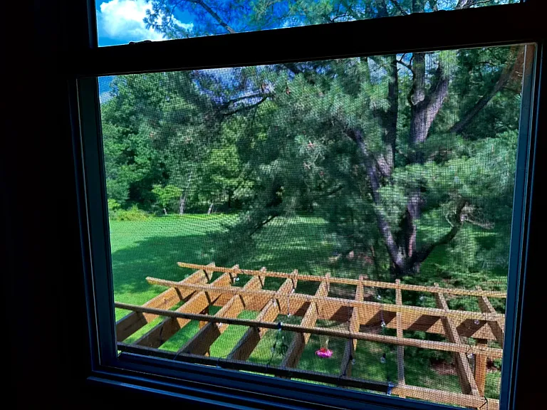Lovers of nature will appreciate this room. Enjoy peaceful scenic views of trees and flowers from the comfort of your space, creating a calm and refreshing atmosphere.