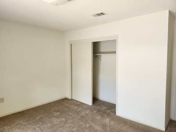 Large bedroom with large closet