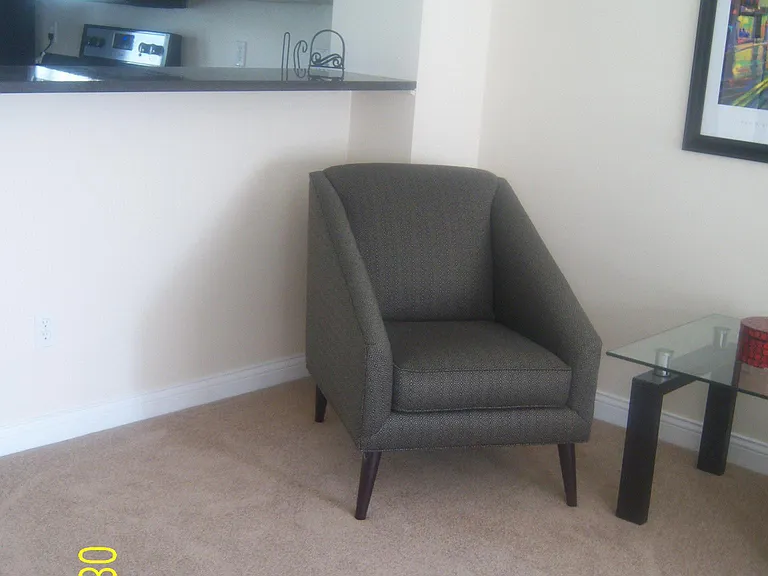 Living room area separated from kitchen