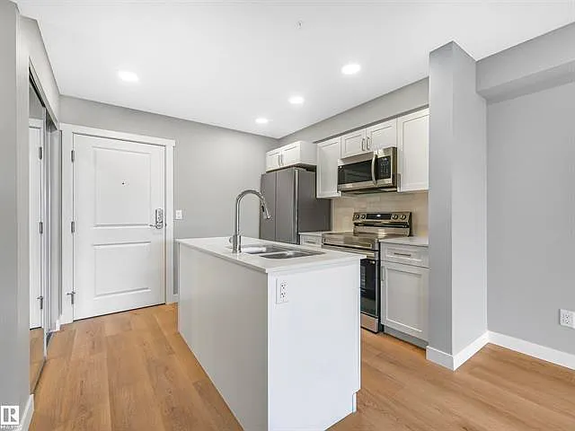 #318 1506 Tamarack Bv Nw — Photo 2
