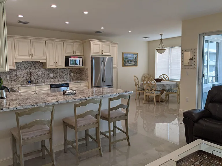 View of the kitchen & dining areas from the living room.