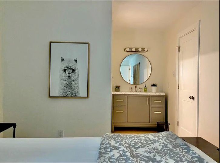 Primary vanity next to large walk-in closet