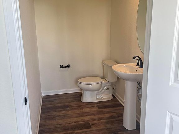 1/2 Bathroom off front entry room/ office