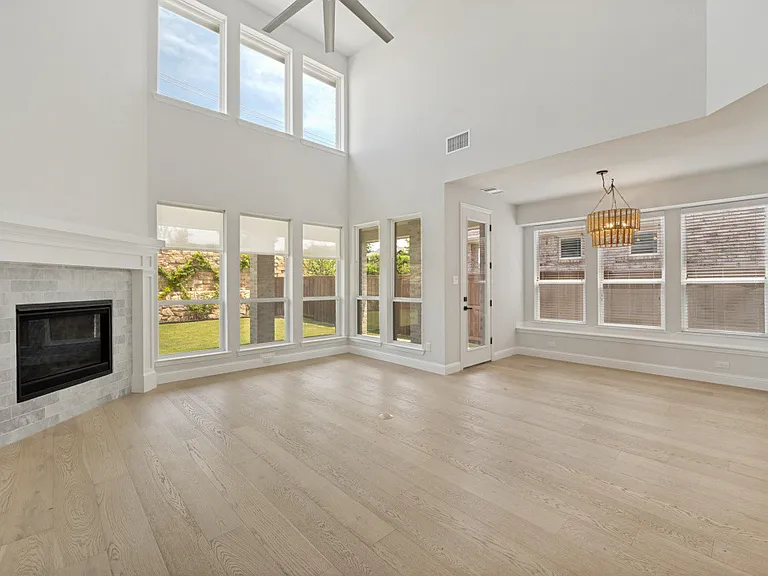 Stunning double windows with ultra private backyard and 9 foot stone wall