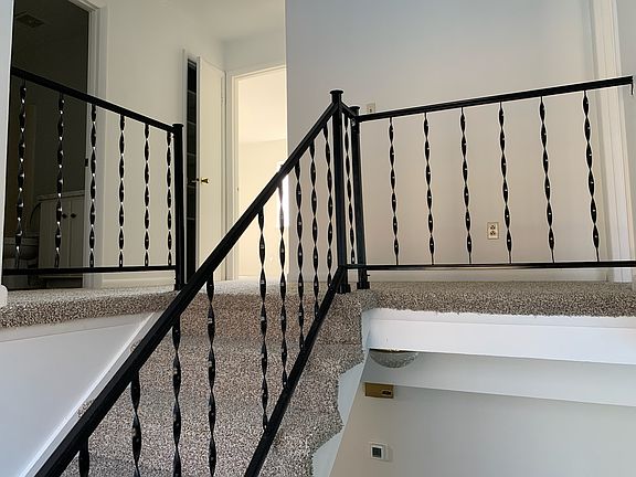 Stairs going up to second floor