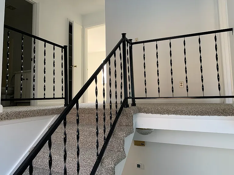 Stairs going up to second floor