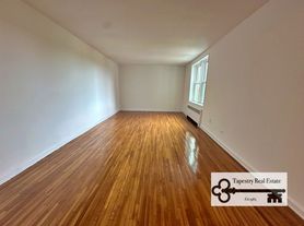 85-11 34th Ave
