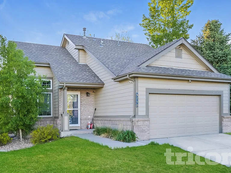 3750 S Quemoy Way — Photo 1