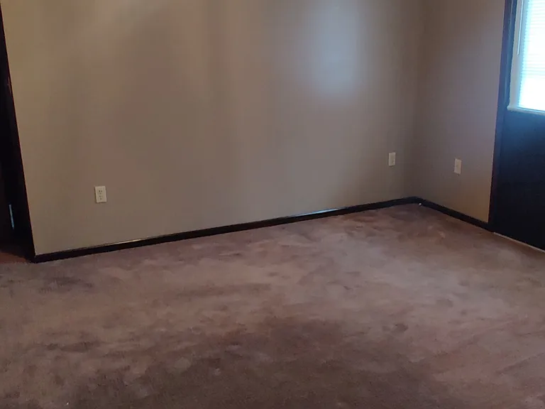 Bedroom #1, with deck door.