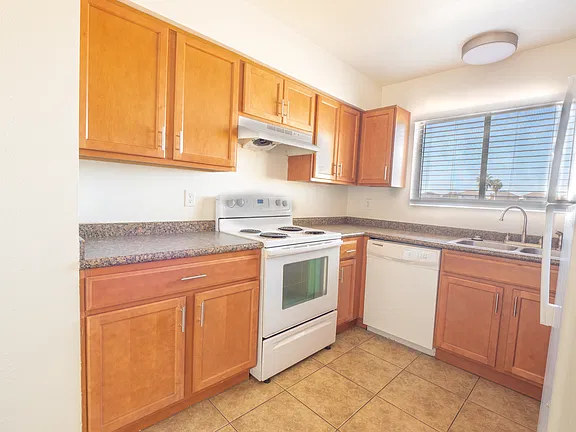 Apartment kitchen — representative home at Fairway Vistas Condominiums.