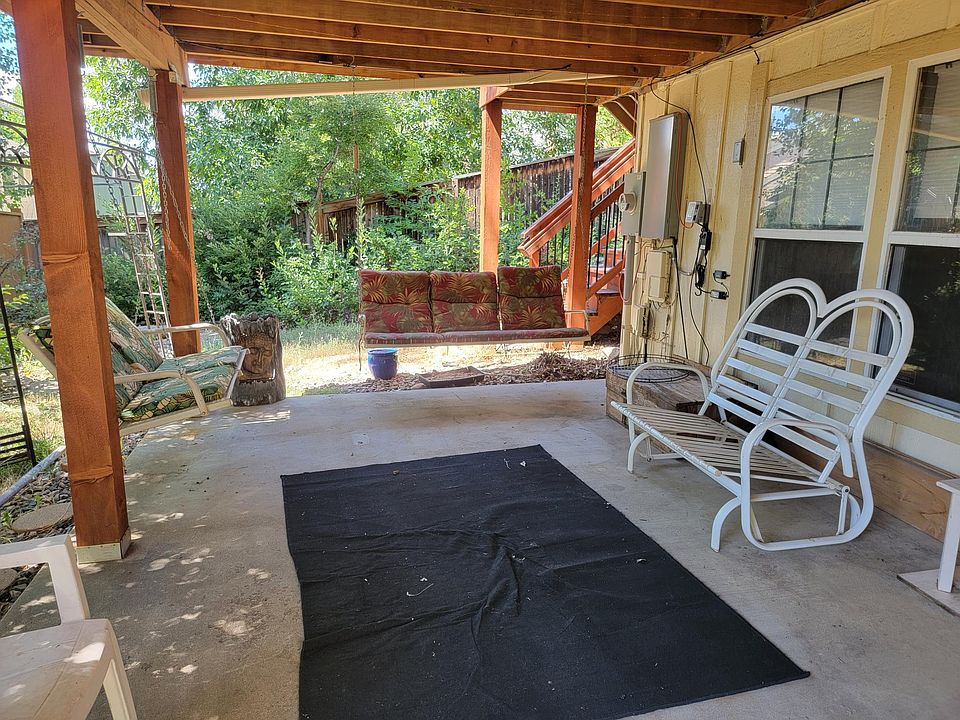 Covered Patio. With two porch swings.