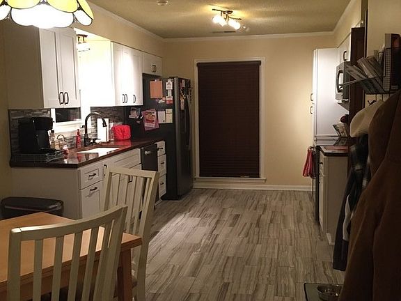 View of kitchen from rear entry door