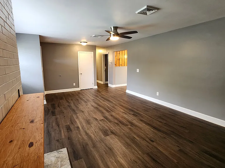 Living room from bonus room/laundry door