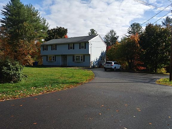 Paved parking for 2 cars with an additional space at the turn around.