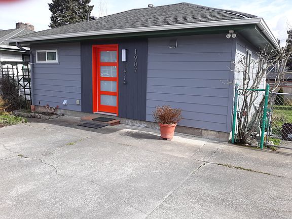 Room for patio table and chairs at front or side of cottage. 

Park right at your front door.