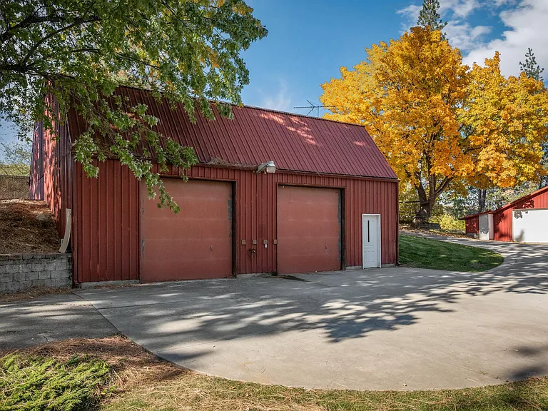 Large shop with tall garage doors. All shops are drywalled and heated