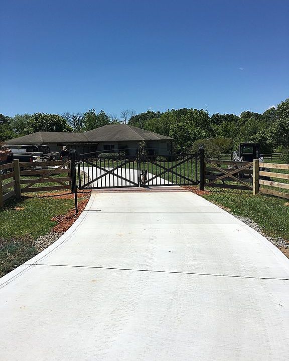 New concrete drive & fence