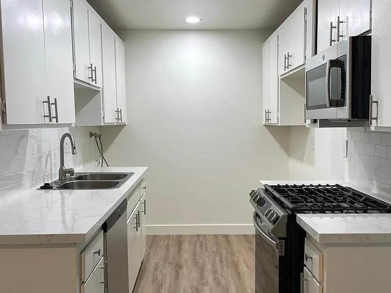 Flat level apartment kitchen, full view.
--
*Floor plans are digital renderings. All dimensions are approximate. Actual product and specifications may vary in dimension or detail. Not all features are available in every apartment. Prices and availability