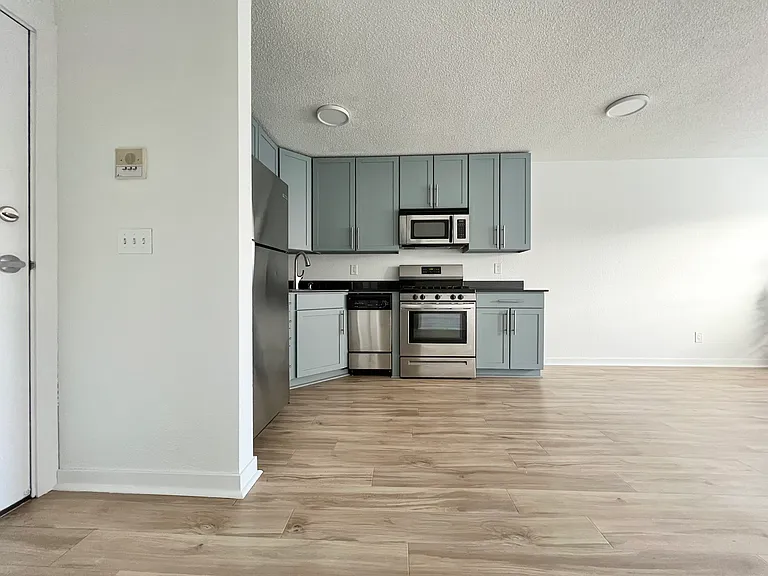 Entryway and Kitchen.