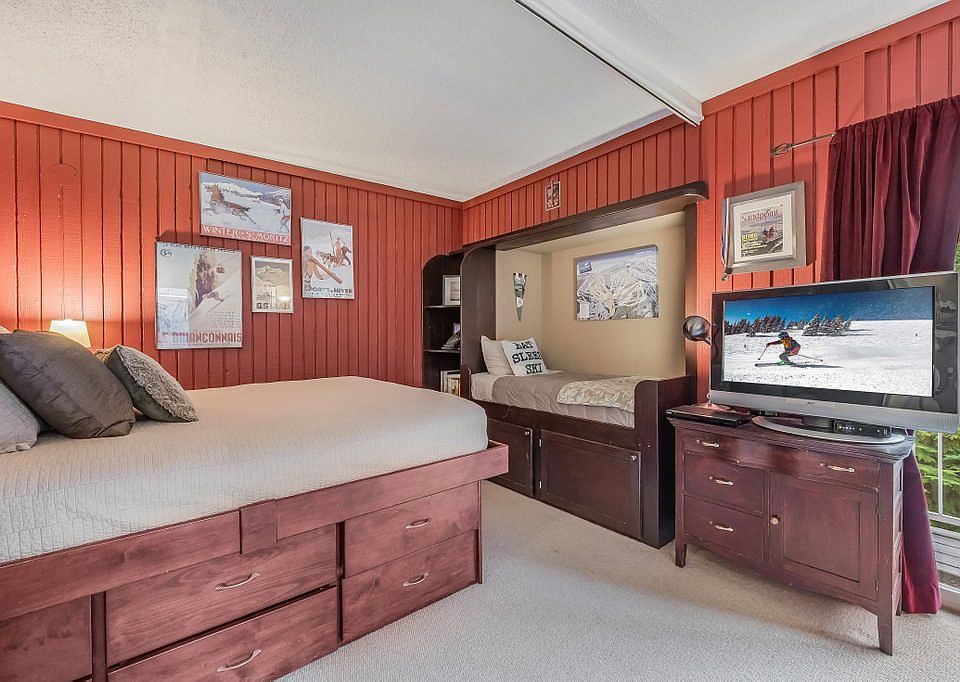 The child's bed nook is a custom built piece that the little ones will enjoy!