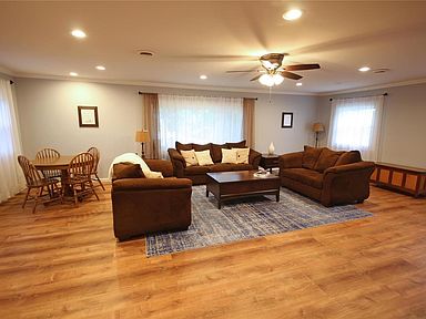 Massive great room with newer flooring.