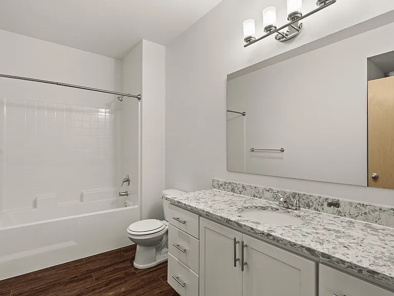 Updated bathroom with granite-style countertop Updated bathroom with granite-style countertop