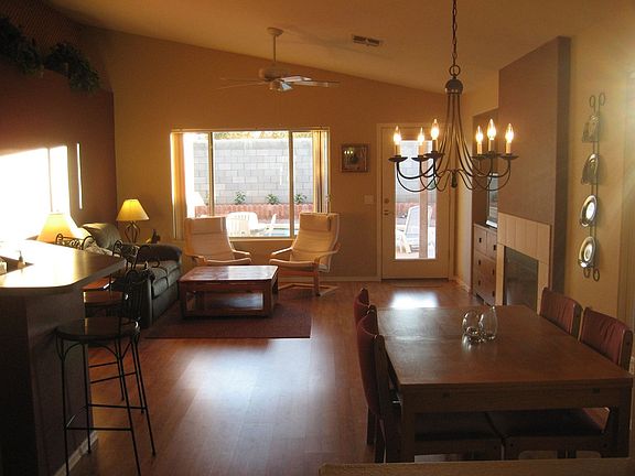 An open family room with an easy to use gas fireplace.
