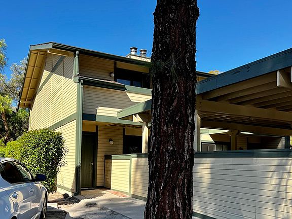 Reserved parking to left of front door.