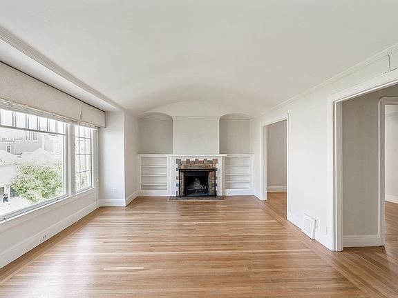 Living room with fireplace and closet