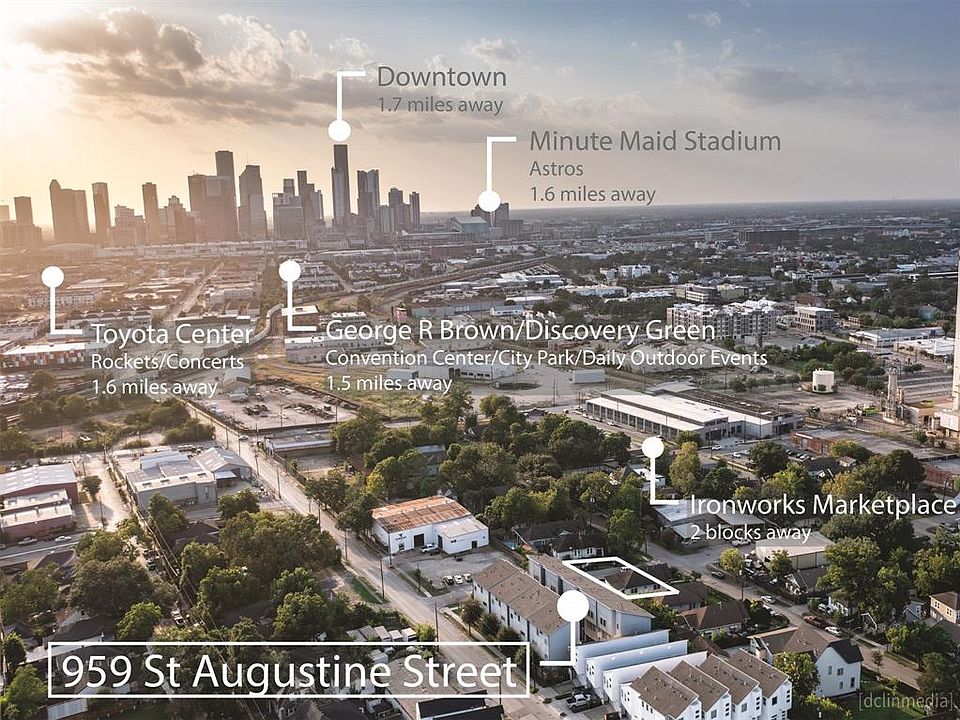 An aerial view of Minute Maid Park and the downtown skyline