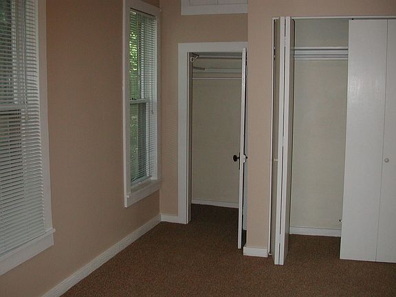 East end of Master Bedroom, 2 closets + attic cedar lined st