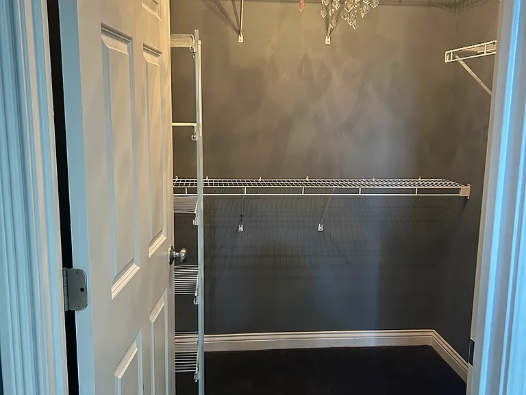 Bedroom# 1 Closet with chandelier.