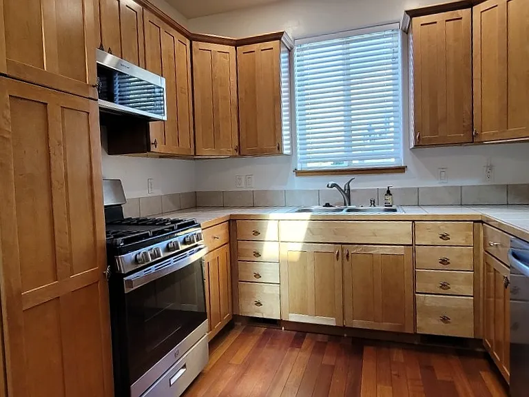 All new appliances - range, microwave, dishwasher, fridge, and garbage disposal