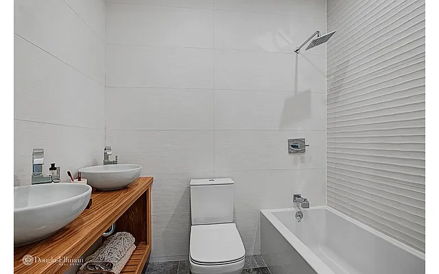 Sold by Douglas Elliman | media 18