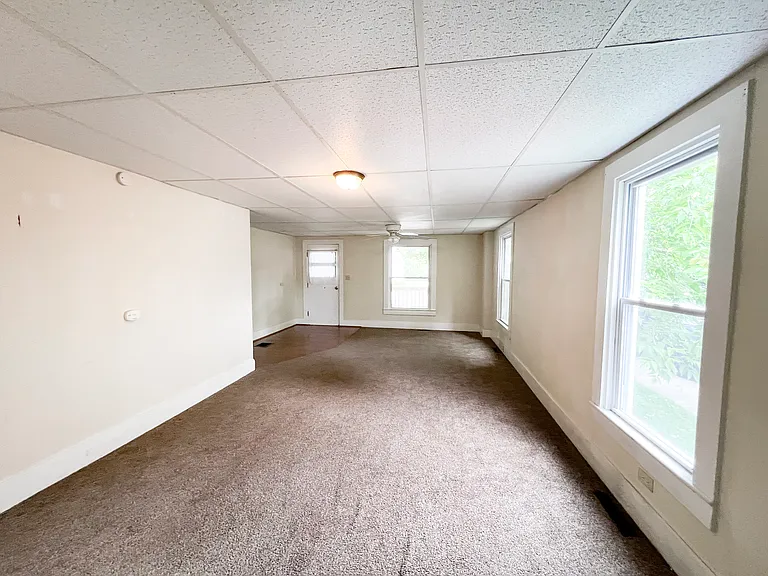 Spacious Living Room and Dining Room fully Carpeted