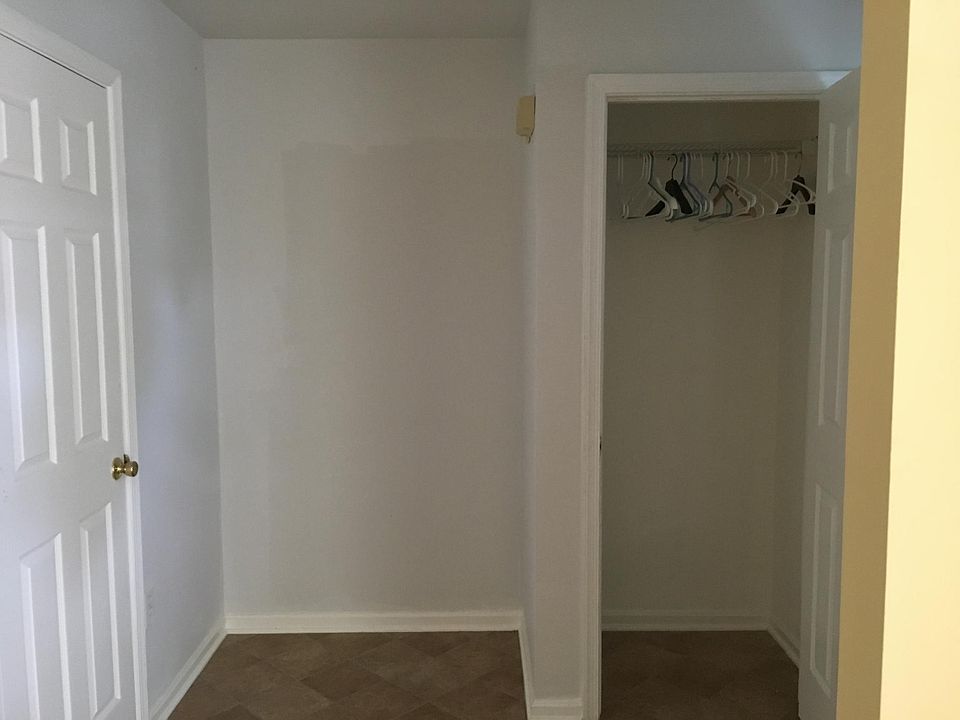 Entryway and closet (right), half bath (left)