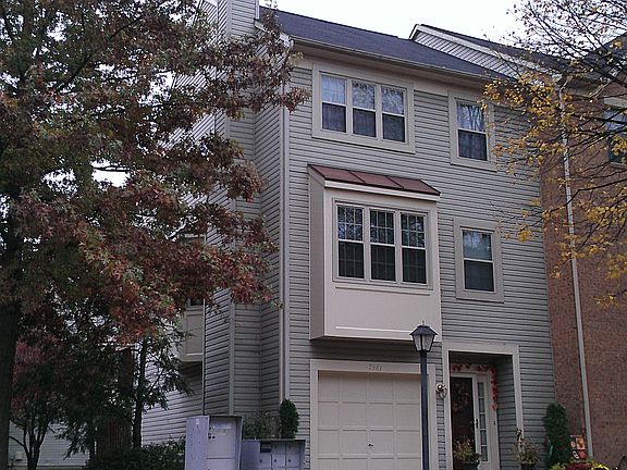 Front of house, side view.