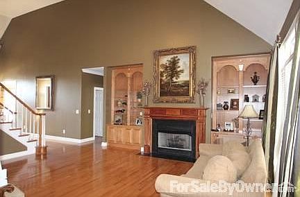 Living room
						:
						Open space with fireplace, built-in bookshelves & storage.