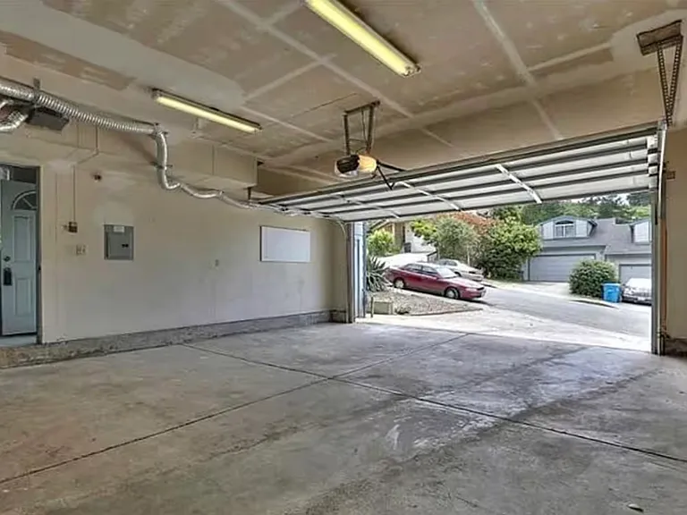 2 car garage with laundry, can park 2 cars in garage and 2 cars on driveway.