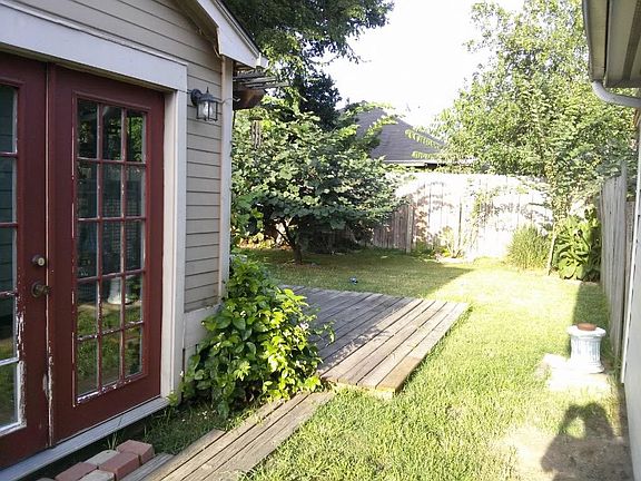 Lovely landscaped back yard.