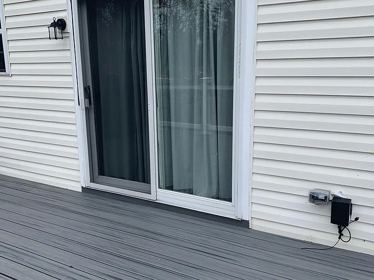 Door to deck from Kitchen/dining area