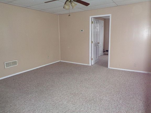 Large Living Room with 2 sets of windows for great natural l