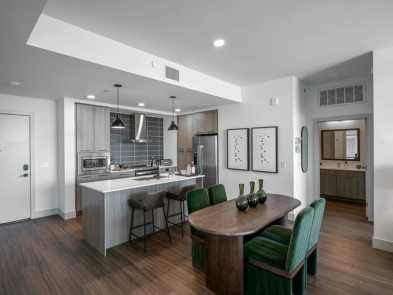 A refined kitchen and dining space that blends natural tones with bold accents.