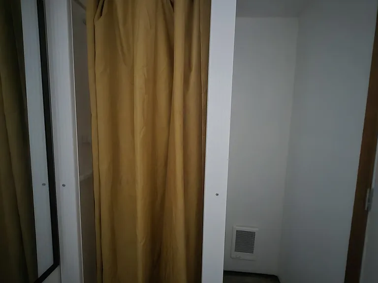 Stand up shower, in the bathroom.