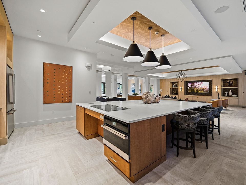 Entertaining kitchen and social lounge, outfitted with a suite of premium appliances