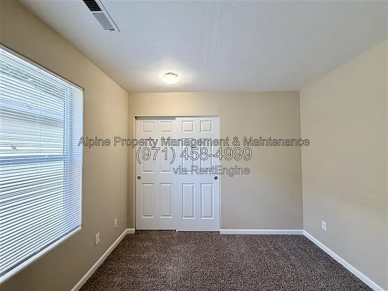 5758 NE Damsel Dr — Photo 26