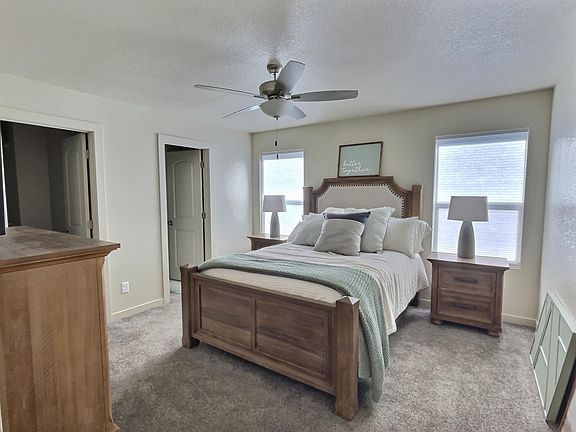 Master room of similar unit. Model home pic--example of furnishing.