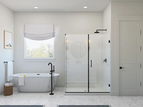 Primary bath with glass shower enclosure